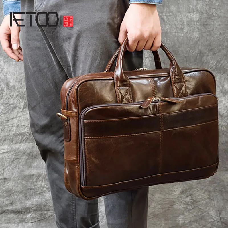 AETOO Men's leather briefcase, business handbag, first layer leather shoulder bag, computer bag
AETOO Men's leather briefcase, business handbag, first layer leather shoulder bag, computer bag