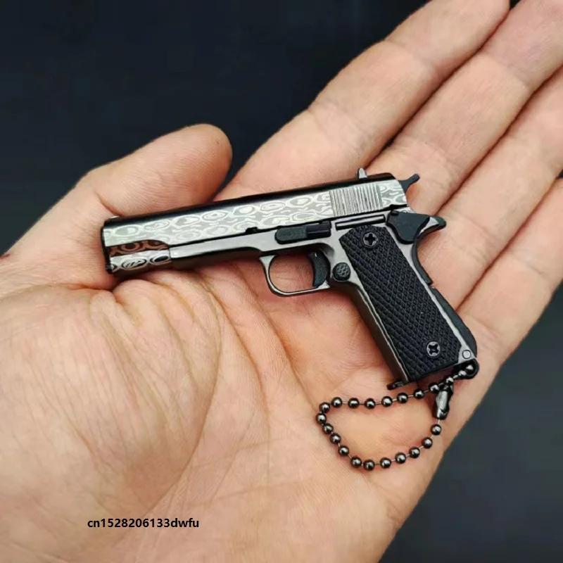 Металлический пистолет, миниатюрная модель 1: 9 Beretta 92F Glock 17 Colt 1911 детской игрушки, пустынный Орел, реквизит, подвеска, подарки на день рождения
Металлический пистолет, миниатюрная модель 1: 9 Beretta 92F Glock 17 Colt 1911 детской игрушки, пустынный Орел, реквизит, подвеска, подарки на день рождения