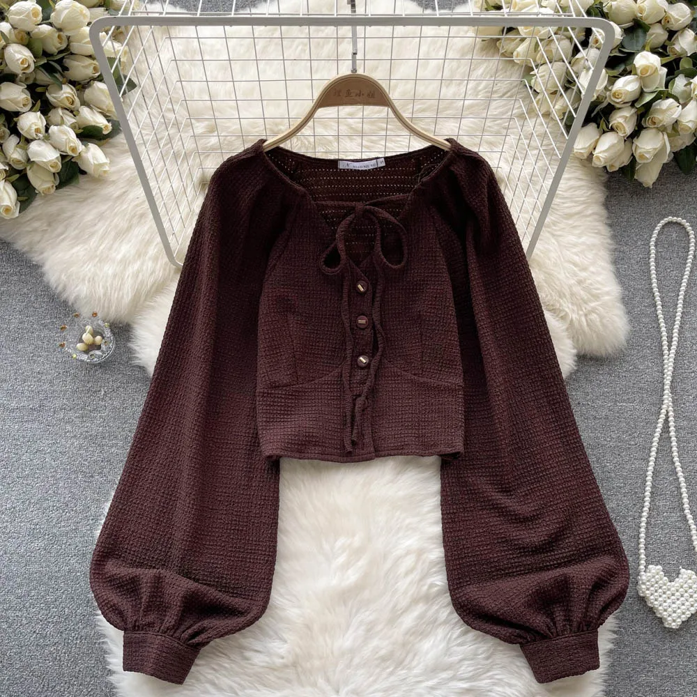 Autumn New Design Sense V-neck Drawstring Tie Single-breasted Muscle Sense Lantern Sleeves Short Section Long-sleeved Blouses
Autumn New Design Sense V-neck Drawstring Tie Single-breasted Muscle Sense Lantern Sleeves Short Section Long-sleeved Blouses