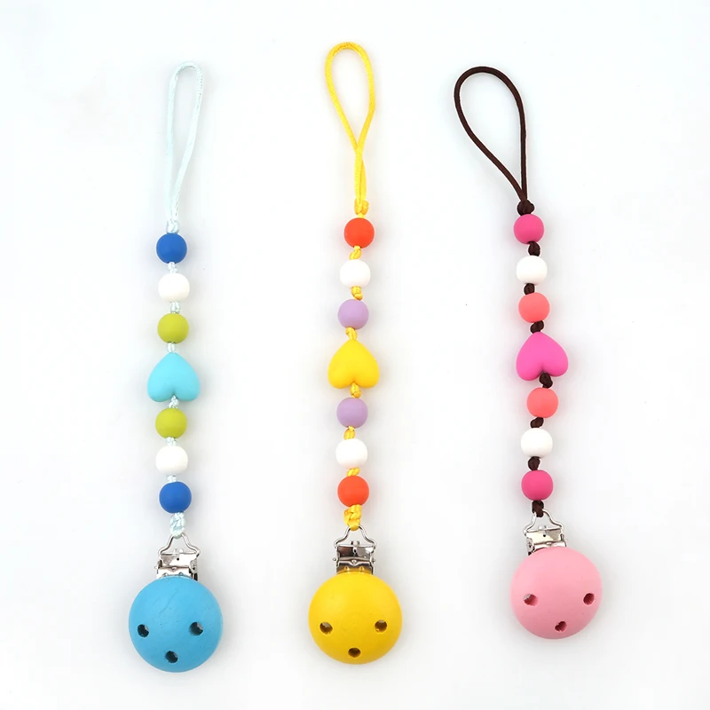 Baby Pacifier Chain Wood Soother Clips Chain Holder Silicone Beads Teething Pacifiers Clip Nipple Chain Infant
Baby Pacifier Chain Wood Soother Clips Chain Holder Silicone Beads Teething Pacifiers Clip Nipple Chain Infant