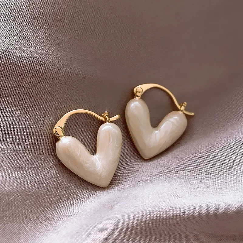 2023 New Korean Light Luxury White Oil Dropping Love Heart Earrings For Women Fashion Elegant Metal Female Party Earring Jewelry
2023 New Korean Light Luxury White Oil Dropping Love Heart Earrings For Women Fashion Elegant Metal Female Party Earring Jewelry
