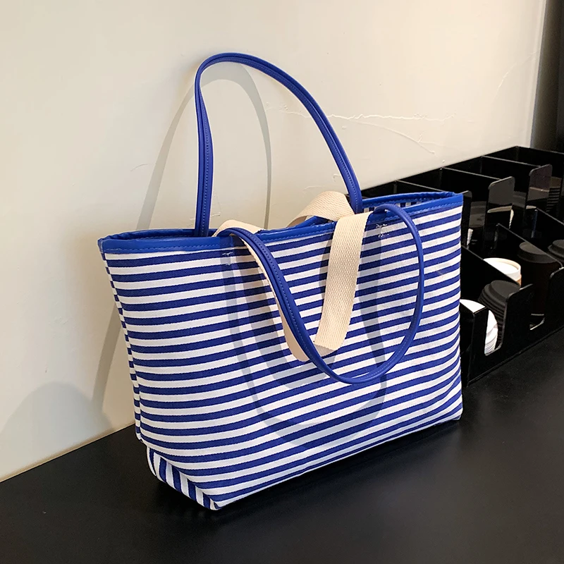 Stripe Totes PU Leather Shoulder Bags for Women 2022 Hit Summer Simple Large Capacity Casual Style Travel Big Handbags
Stripe Totes PU Leather Shoulder Bags for Women 2022 Hit Summer Simple Large Capacity Casual Style Travel Big Handbags