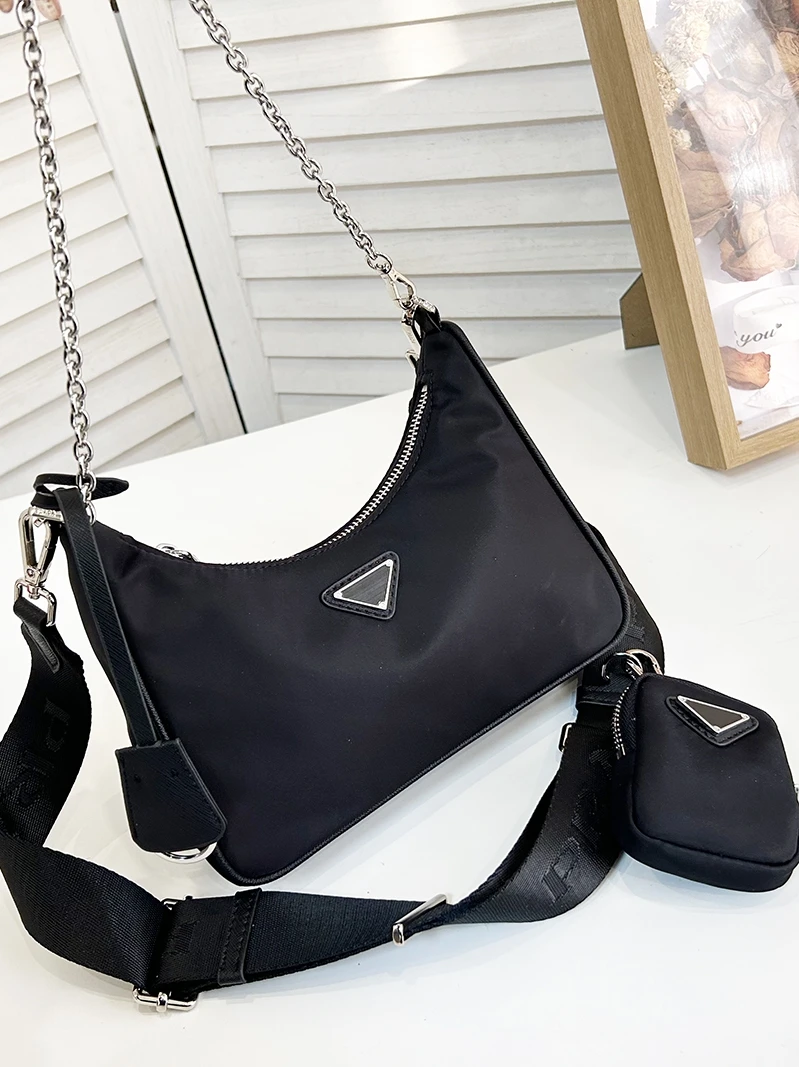 Regenerated nylon hobo three in one underarm bag 2023 summer new versatile one shoulder chain crossbody luxury women's bag
Regenerated nylon hobo three in one underarm bag 2023 summer new versatile one shoulder chain crossbody luxury women's bag