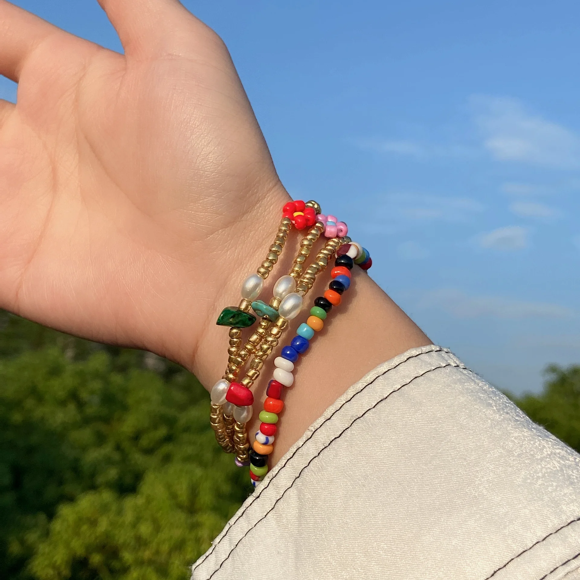 Rural color Beaded pine stone Elastic Bracelet holiday style rice beads imitation pearl hand ornaments for women
Rural color Beaded pine stone Elastic Bracelet holiday style rice beads imitation pearl hand ornaments for women