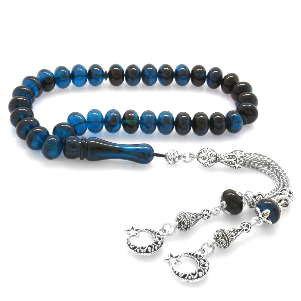 Nipora Tarnish Metal Crescent and Star Tasseled Wheel Cut Strained Blue-Black Squeezed Amber Rosary
Nipora Tarnish Metal Crescent and Star Tasseled Wheel Cut Strained Blue-Black Squeezed Amber Rosary