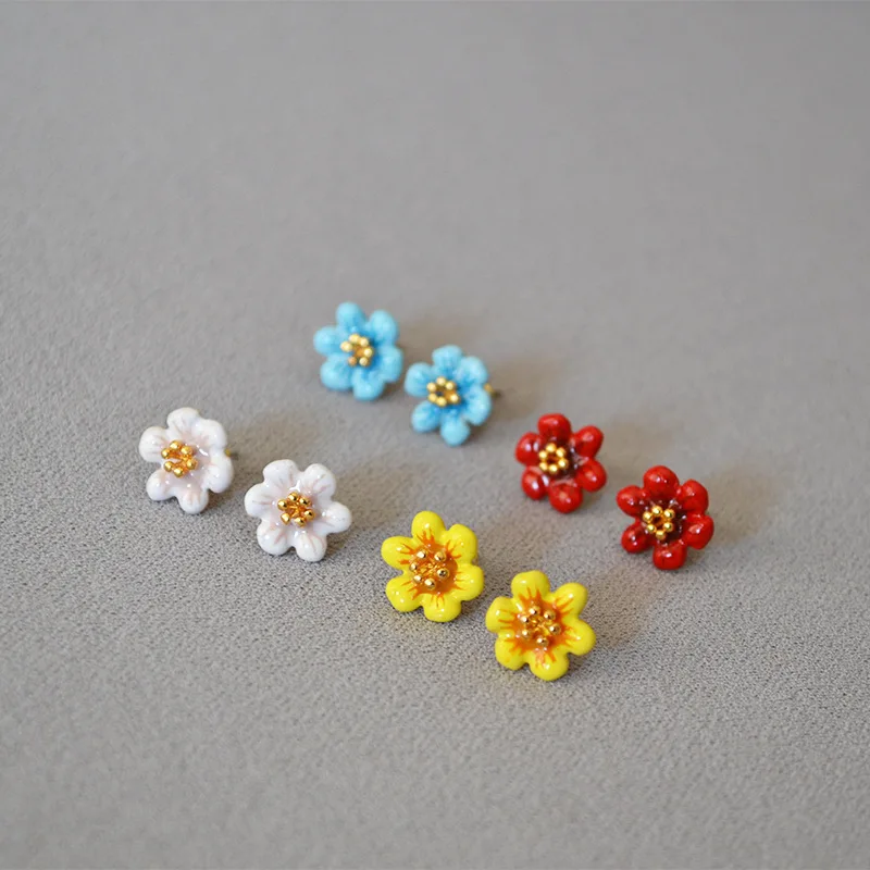 Handmade enamel drop glaze romantic camellia daily temperament 925 silver needle stud earrings earrings 
Handmade enamel drop glaze romantic camellia daily temperament 925 silver needle stud earrings earrings