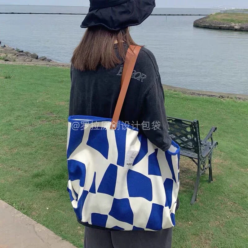 Nobag original niche grid geometry large capacity canvas bag women's one shoulder Korean casual student Tote Bag ins
Nobag original niche grid geometry large capacity canvas bag women's one shoulder Korean casual student Tote Bag ins