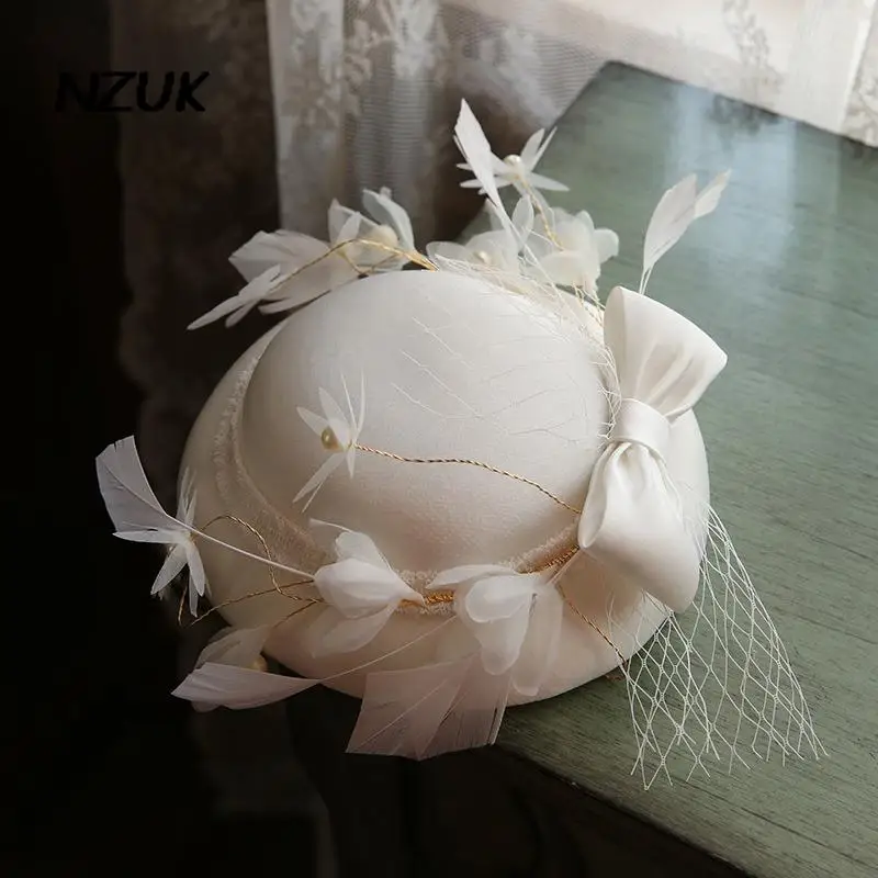 Elegant Ladies Satin bow Wedding Hat Fascinator Hair Clip Feather Pearl Bead Vintage Cocktail Headpieces cocktail hat
Elegant Ladies Satin bow Wedding Hat Fascinator Hair Clip Feather Pearl Bead Vintage Cocktail Headpieces cocktail hat