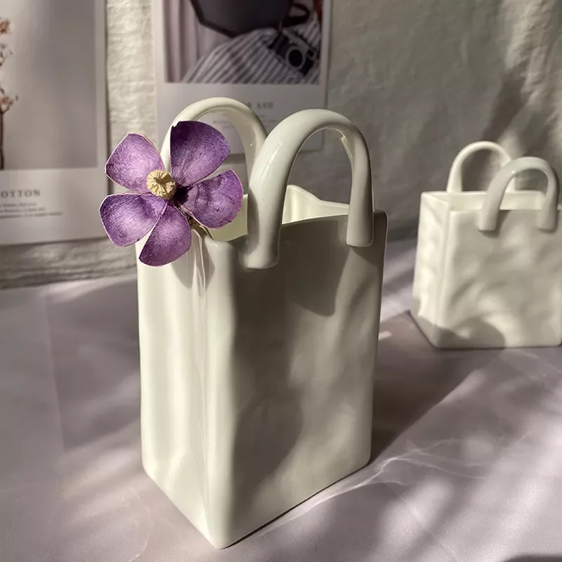 NEW Nordic Portable Vase White Ceramic Vase Modern Home Decor Accessories Living Room Decoration Garden Bedroom Ornaments 
NEW Nordic Portable Vase White Ceramic Vase Modern Home Decor Accessories Living Room Decoration Garden Bedroom Ornaments
