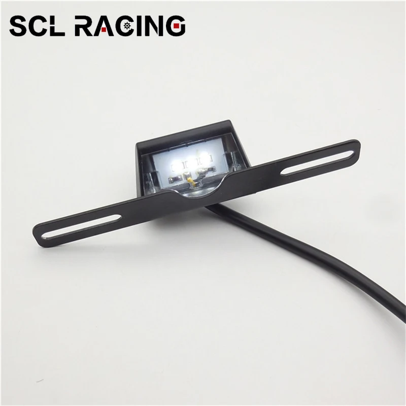 Универсальный светодиодный задний фонарь SCL Racing 12 В для мотоцикла, подсветсветильник для номерного знака, задний светодиодный фонарь с кронштейном для всех моделей
Универсальный светодиодный задний фонарь SCL Racing 12 В для мотоцикла, подсветсветильник для номерного знака, задний светодиодный фонарь с кронштейном для всех моделей