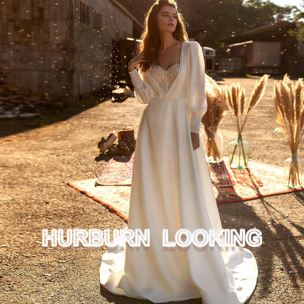 Женское свадебное платье HERBURN, простое платье со шлейфом и жемчужинами, на пуговицах, индивидуальное платье
Женское свадебное платье HERBURN, простое платье со шлейфом и жемчужинами, на пуговицах, индивидуальное платье
