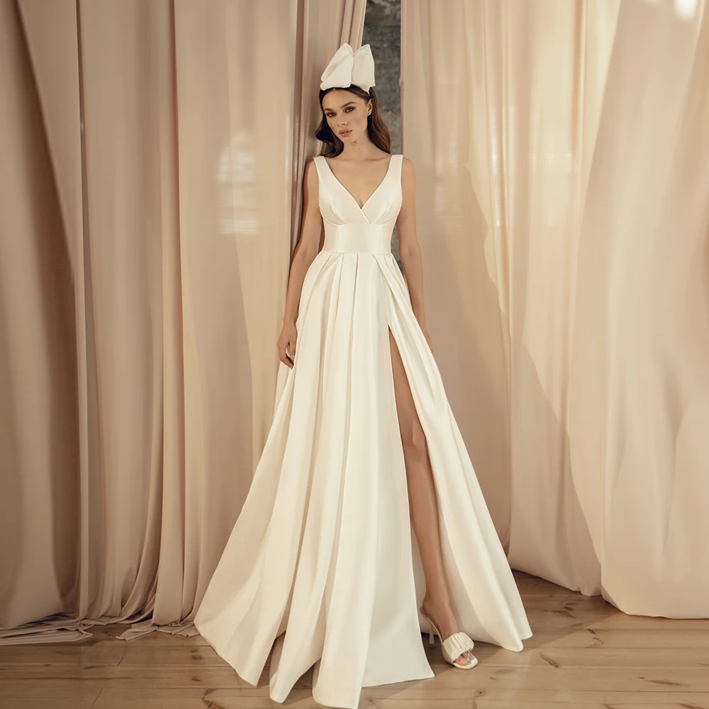 Simple Classic Wedding Dresses 2022 New V-Neck Sleeveless Satin Dress A-Line Sweep Train Open Back Side Slit Bridal Gowns платье
Simple Classic Wedding Dresses 2022 New V-Neck Sleeveless Satin Dress A-Line Sweep Train Open Back Side Slit Bridal Gowns платье