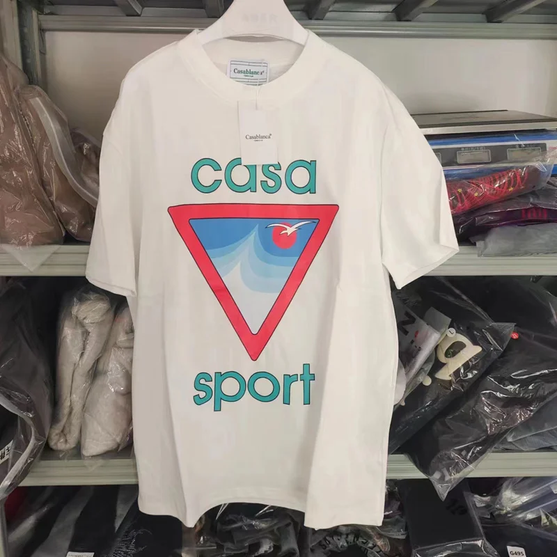 Oversize Seagull Triangle Waves Print 100% Cotton Tennis Club Casablanca T-Shirt Men Women Summer Short Sleeve
Oversize Seagull Triangle Waves Print 100% Cotton Tennis Club Casablanca T-Shirt Men Women Summer Short Sleeve