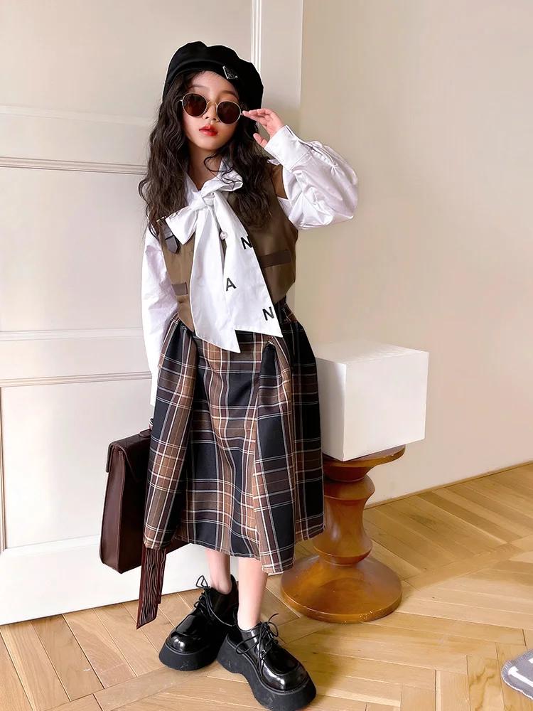 Girls' design shirt 2022 spring new casual wild white long-sleeved shirt plaid skirt trend
Girls' design shirt 2022 spring new casual wild white long-sleeved shirt plaid skirt trend