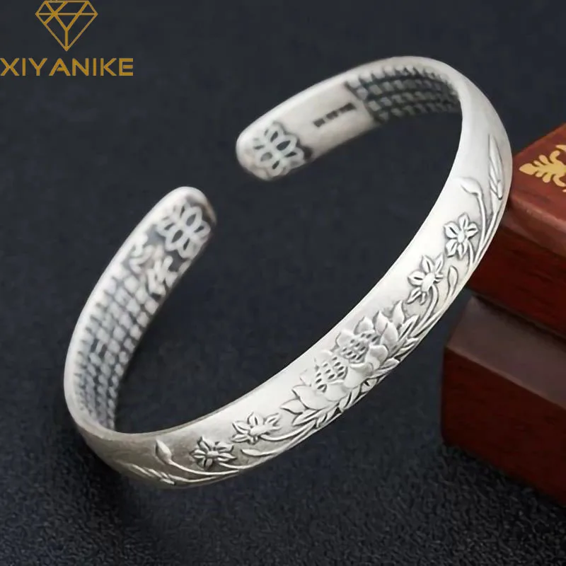 XIYANIKE Women Retro Thai Silver Lotus Heart Sutra Cuff Bracelet Fashion New Vintage Jewelry Party Friend Gift pulseras mujer
XIYANIKE Women Retro Thai Silver Lotus Heart Sutra Cuff Bracelet Fashion New Vintage Jewelry Party Friend Gift pulseras mujer