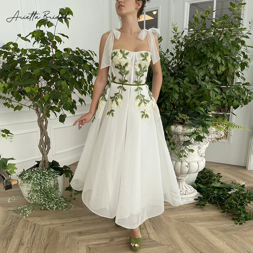 Arietta Ivory Mesh Net Tulle Midi Prom Dresses Strapless Bow Straps Appliqued Tea-Length A-Line Wedding Party Gowns with Pockets
Arietta Ivory Mesh Net Tulle Midi Prom Dresses Strapless Bow Straps Appliqued Tea-Length A-Line Wedding Party Gowns with Pockets