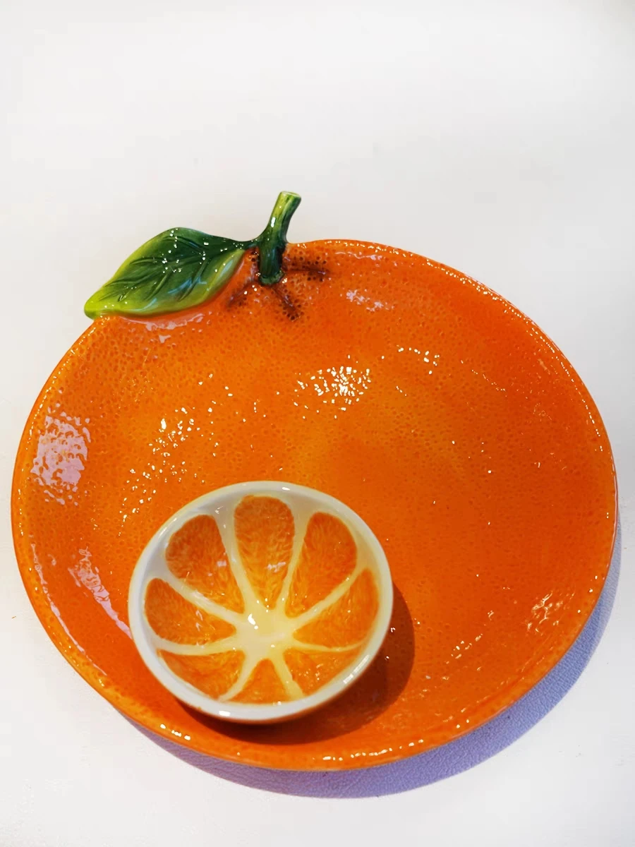 Ceramic candy plate creative snack plate living room table coffee table ornaments ornaments fruit dessert plate apples.
Ceramic candy plate creative snack plate living room table coffee table ornaments ornaments fruit dessert plate apples.