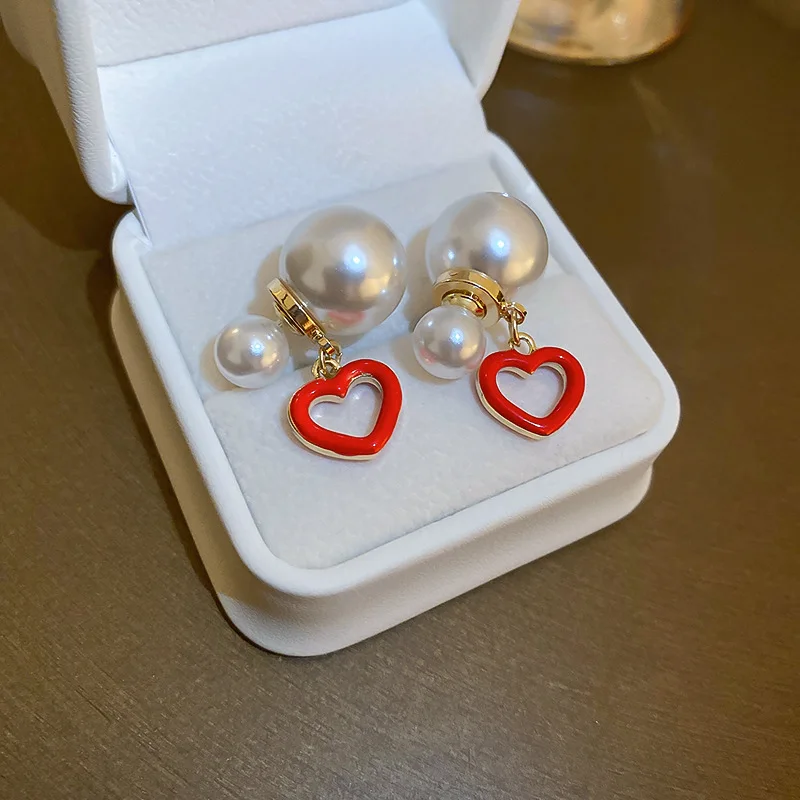 Minar Stylish Hollow Out Red Color Enamel Love Heart Earring for Women Ladies White Faux Pearl Stud Earrings Daily Jewellery
Minar Stylish Hollow Out Red Color Enamel Love Heart Earring for Women Ladies White Faux Pearl Stud Earrings Daily Jewellery