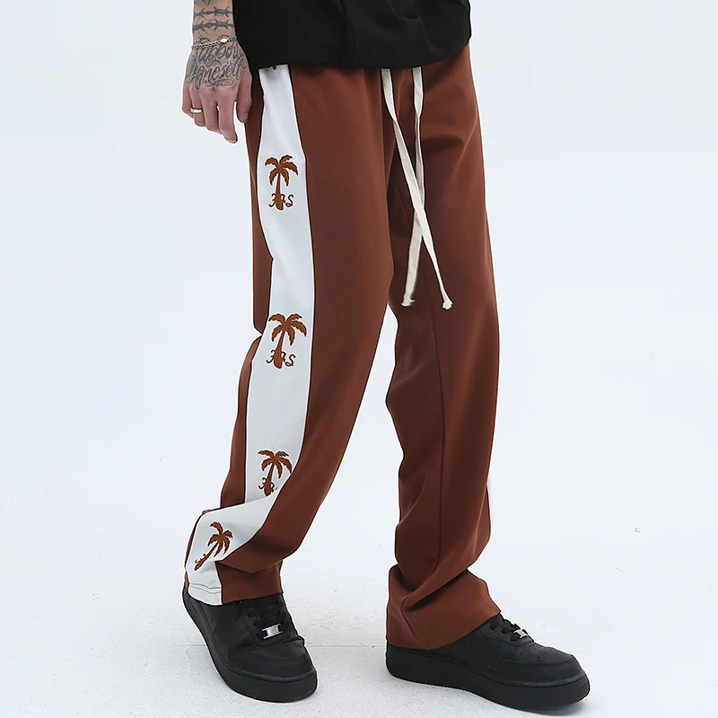 Side Trees Embroidery Striped Casual Drawstring Trousers Men and Women Wide Leg Patchwork Straight Loose Sweatpants Oversized
Side Trees Embroidery Striped Casual Drawstring Trousers Men and Women Wide Leg Patchwork Straight Loose Sweatpants Oversized