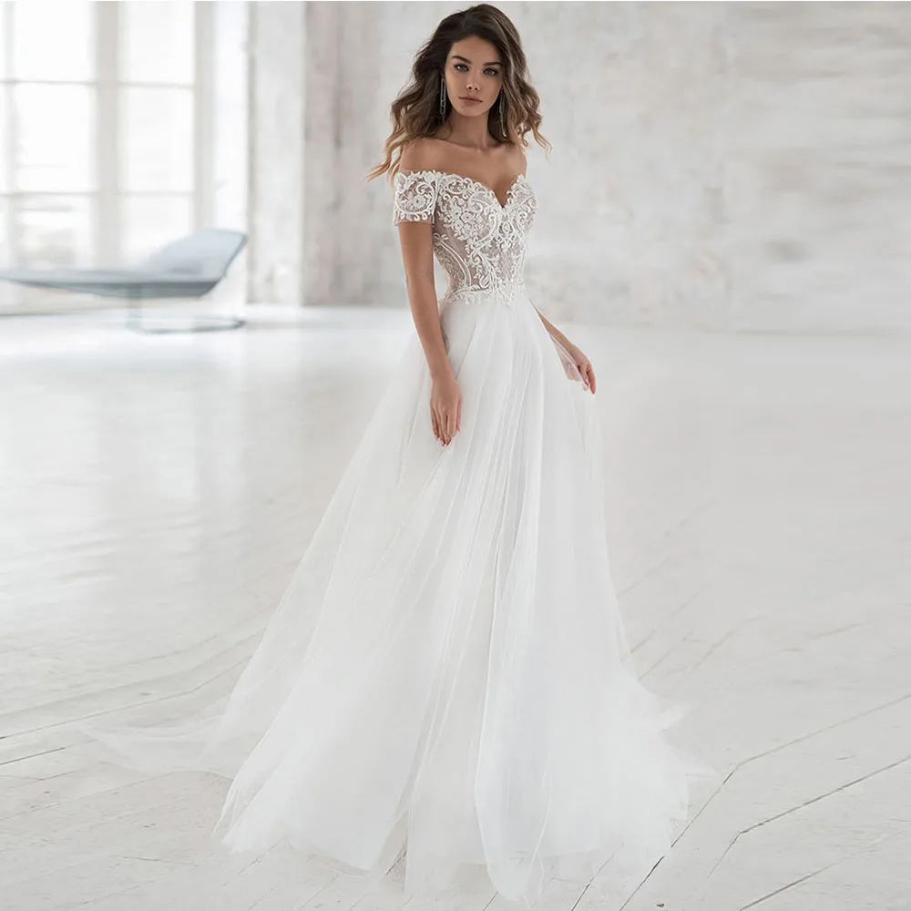 Boho Bride Gowns V-Neck Short Sleeves Zipper Backless Off The Shoulder Wedding Dresses Tulle Sweep Train A-Line Robe De Mariée
Boho Bride Gowns V-Neck Short Sleeves Zipper Backless Off The Shoulder Wedding Dresses Tulle Sweep Train A-Line Robe De Mariée