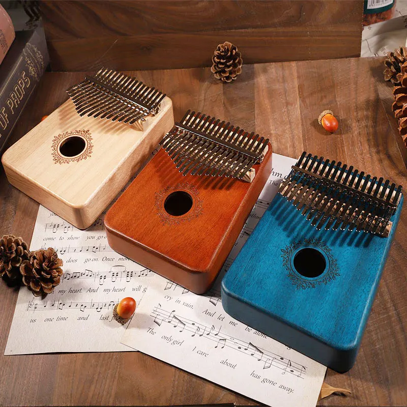 Kalimba 17 клавиш высокое качество дерево красное дерево Mbira корпус музыкальный большой палец пианино музыкальная шкатулка мини carlimba Подарочна... 
Kalimba 17 клавиш высокое качество дерево красное дерево Mbira корпус музыкальный большой палец пианино музыкальная шкатулка мини carlimba Подарочна...