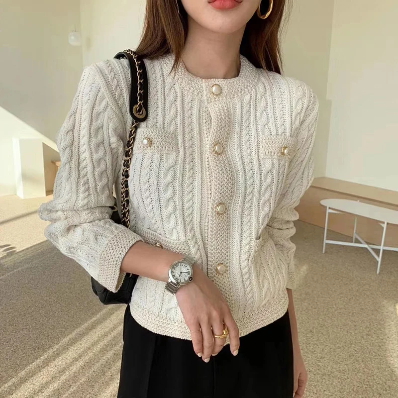 Korean Long Sleeve Loose Knitted Tops Elegant Office-lady O-Neck Pearl Buckle Cardigan Sweater Fashion Twist Women Clothes 28043
Korean Long Sleeve Loose Knitted Tops Elegant Office-lady O-Neck Pearl Buckle Cardigan Sweater Fashion Twist Women Clothes 28043