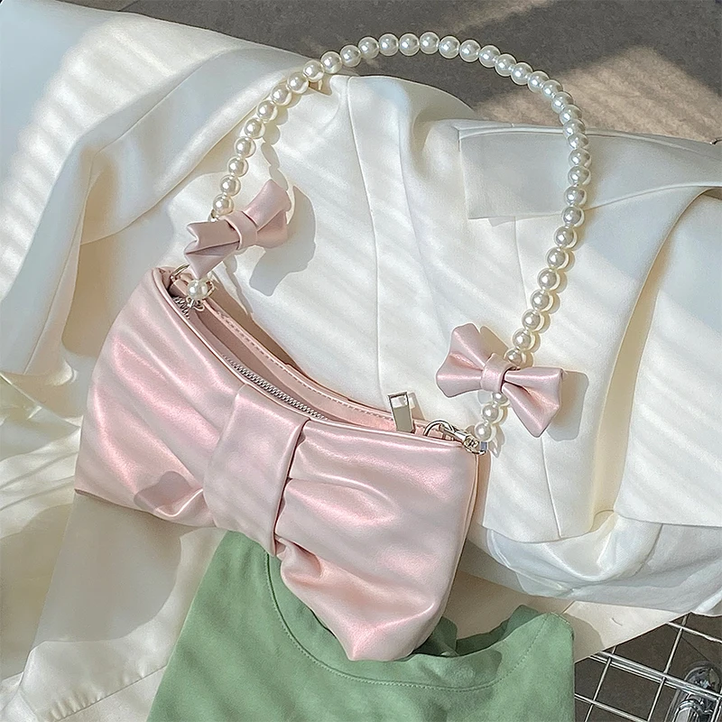 2022 New fashion elegant Japanese nice design underarm shoulder bag sense ladies bow pu leather Pearl chain handbag cute purse
2022 New fashion elegant Japanese nice design underarm shoulder bag sense ladies bow pu leather Pearl chain handbag cute purse