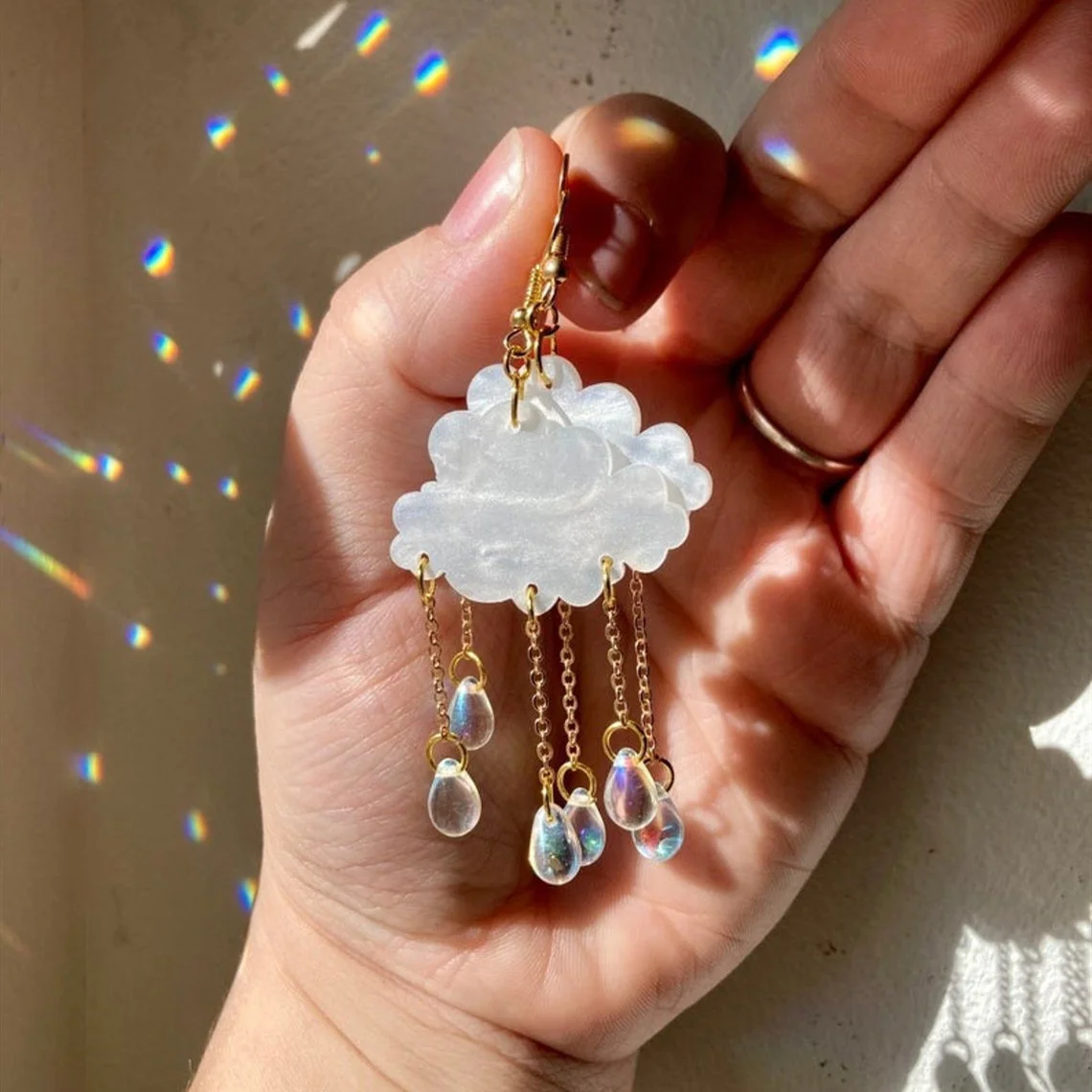 New Simple And Creative Acrylic Rain Cloud Earrings Crystal Teardrop Rain Cloud Earrings
New Simple And Creative Acrylic Rain Cloud Earrings Crystal Teardrop Rain Cloud Earrings