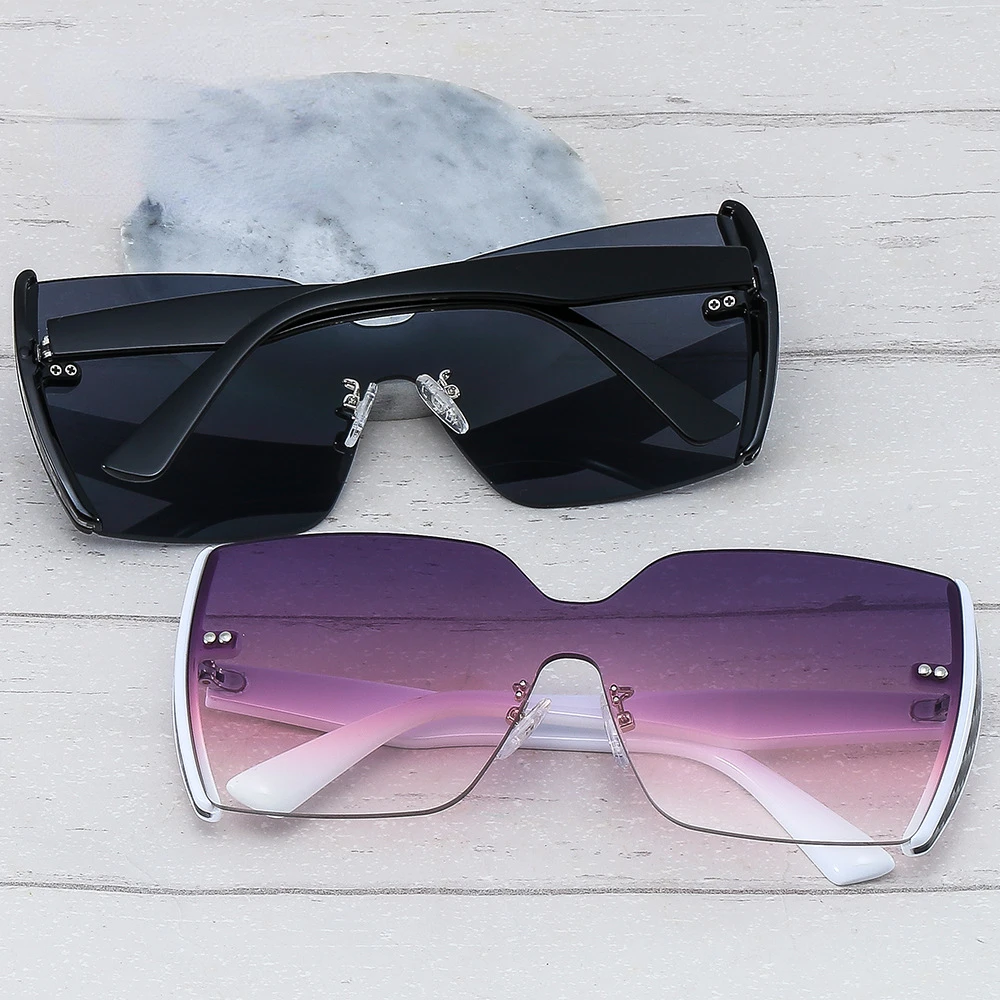 New Elegant Ladies Outdoor Street Shooting Sunglasses Personality One Piece Frameless Sunglasses Plaid Glasses
New Elegant Ladies Outdoor Street Shooting Sunglasses Personality One Piece Frameless Sunglasses Plaid Glasses
