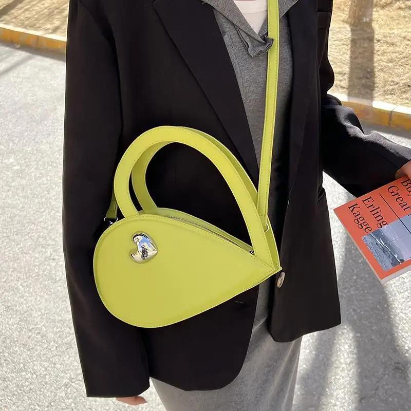 MBTI Individuality Women Crossbody Top Handle Bags Fashion 2022 New Style Heart Shape Shoulder Bags Concise Solid Bolso Mujer
MBTI Individuality Women Crossbody Top Handle Bags Fashion 2022 New Style Heart Shape Shoulder Bags Concise Solid Bolso Mujer