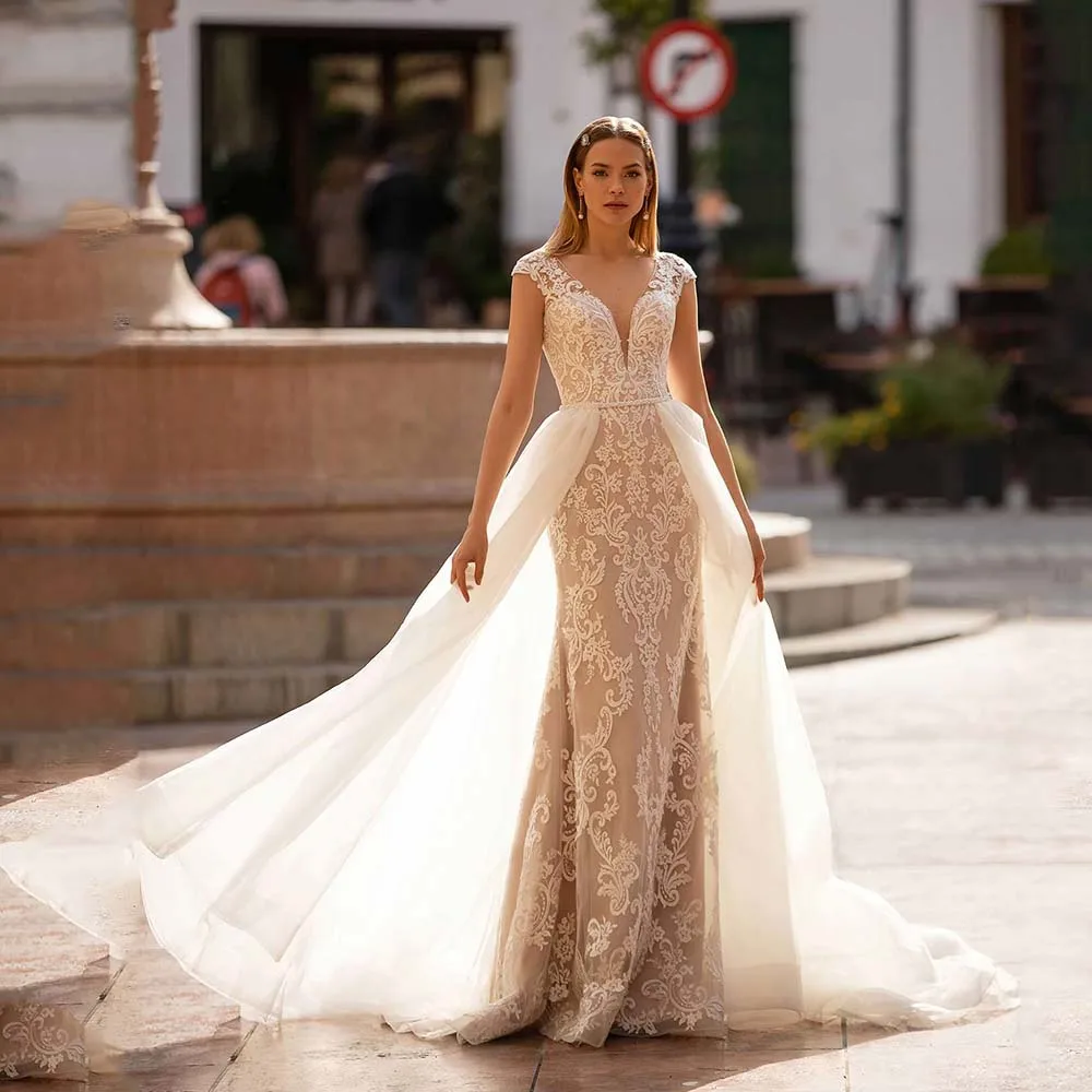 Luxury Wedding Dresses 2022 New Lace Appliques Button Bridal Gown Sexy V-Neck Cap Sleeve Detachable Train Mermaid Bride Dress
Luxury Wedding Dresses 2022 New Lace Appliques Button Bridal Gown Sexy V-Neck Cap Sleeve Detachable Train Mermaid Bride Dress