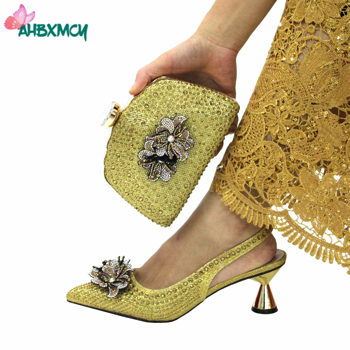 2022 New Mature Gold Color Pointed Toe Sandal Shoes and Bag Set Decorated with Crystal For Nigerian Ladies Party
2022 New Mature Gold Color Pointed Toe Sandal Shoes and Bag Set Decorated with Crystal For Nigerian Ladies Party