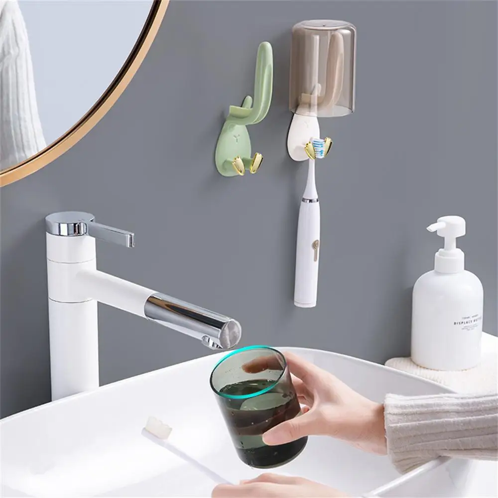 Wall Mounted ToothBrush Holder Plastic Hooks Mouthwash Holder Toothbrush Stand Rack Bathroom Storage Rack Portable Cup Rack
Wall Mounted ToothBrush Holder Plastic Hooks Mouthwash Holder Toothbrush Stand Rack Bathroom Storage Rack Portable Cup Rack