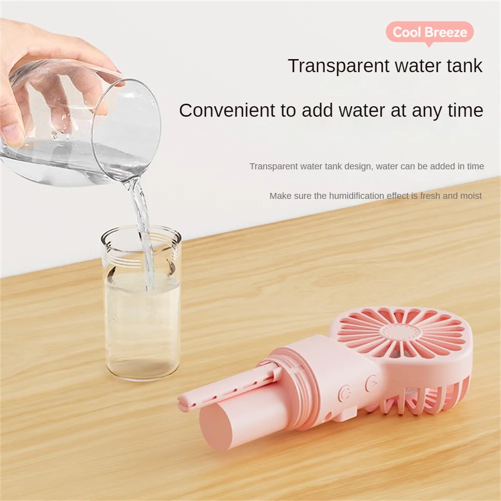 USB Water Cooling Fan Battery Operated Small Handheld Fan With Mist Spray Mini Fan Spray Water Mist Spray Fan
USB Water Cooling Fan Battery Operated Small Handheld Fan With Mist Spray Mini Fan Spray Water Mist Spray Fan