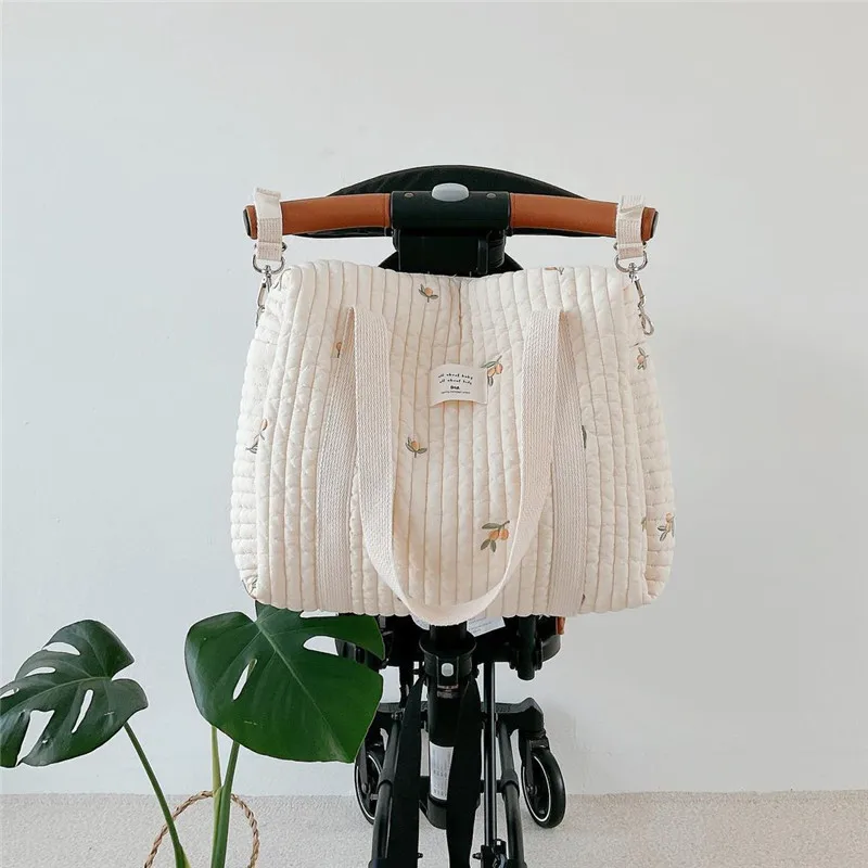 Korea Style Newborn Baby Care Diaper Bag Mummy Shoulder Bag Embroidery Quilted Stroller Diaper Storage Organizer Large Handbags
Korea Style Newborn Baby Care Diaper Bag Mummy Shoulder Bag Embroidery Quilted Stroller Diaper Storage Organizer Large Handbags