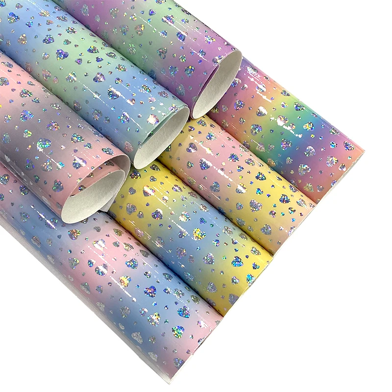 Rainbow Gradient Holographic Gloss Faux Leather Roll Fabric Sheets for Bag Bows DIY Handmade Material PU Leathers 46*135cm 
Rainbow Gradient Holographic Gloss Faux Leather Roll Fabric Sheets for Bag Bows DIY Handmade Material PU Leathers 46*135cm