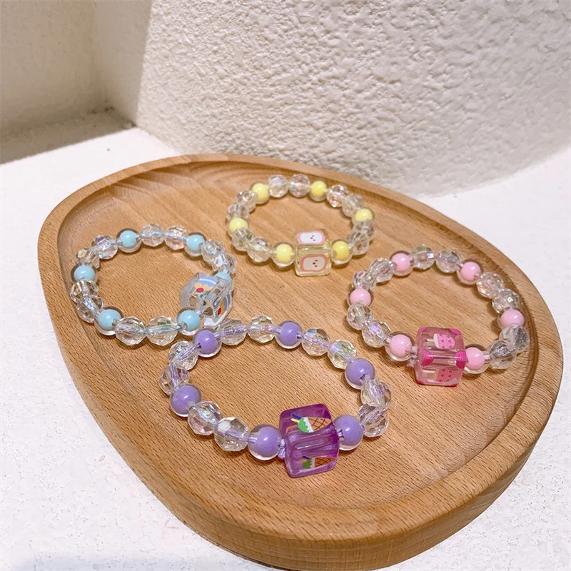Summer New Korea Sweet Girl Cute Beautiful Transparent Beaded Hair Rope Hair Accessories Fashion Children Rubber Band Headwear 
Summer New Korea Sweet Girl Cute Beautiful Transparent Beaded Hair Rope Hair Accessories Fashion Children Rubber Band Headwear