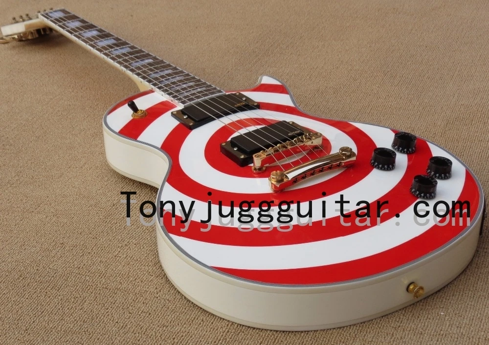 Пользовательский магазин Zakk Wylde Red bullseye белая электрическая гитара черные ручки скорости, белая жемчужная блочная инкрустация, копия EMG Pickups,
Пользовательский магазин Zakk Wylde Red bullseye белая электрическая гитара черные ручки скорости, белая жемчужная блочная инкрустация, копия EMG Pickups,