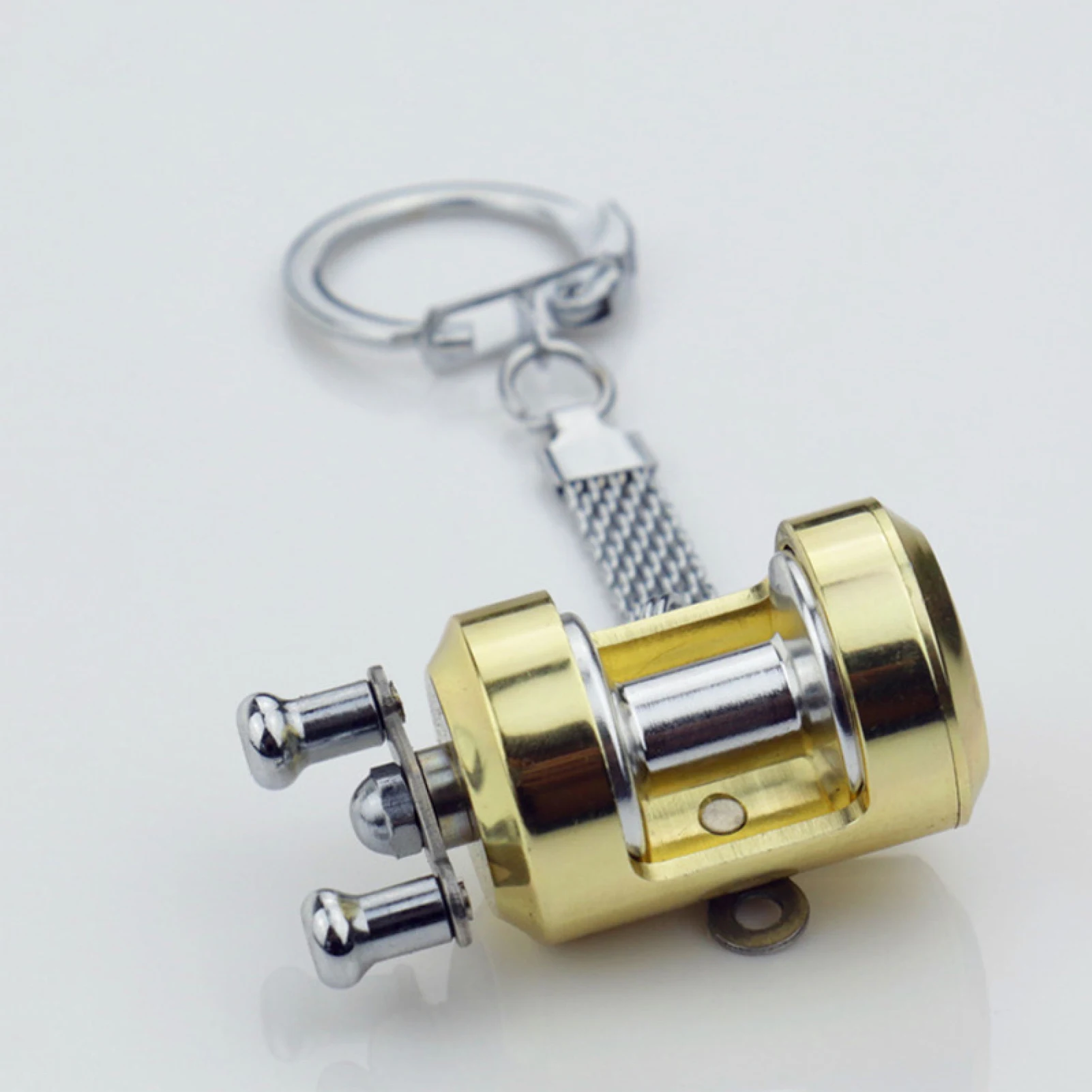 Fish Wheel keychain Gold Color Fly Fisherman Spinning Fishing Reel Charactor Miniature Key chain With Key Ring Gifts
Fish Wheel keychain Gold Color Fly Fisherman Spinning Fishing Reel Charactor Miniature Key chain With Key Ring Gifts
