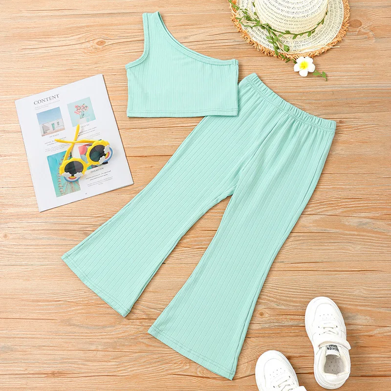 Two-piece Young Children 2 Piece Set Summer Shoulder + Bell-bottom Small Pit Strip Solid Color Cool Suit Baby Girl Clothes Set
Two-piece Young Children 2 Piece Set Summer Shoulder + Bell-bottom Small Pit Strip Solid Color Cool Suit Baby Girl Clothes Set