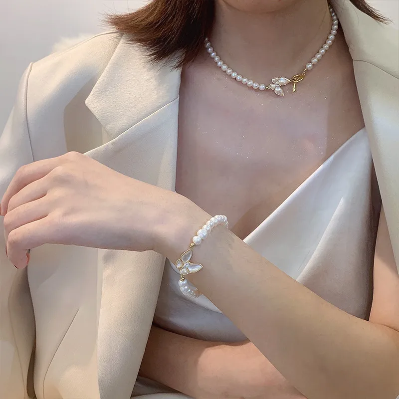 2022 New fashion pearl gold necklace bracelet set, delicate butterfly shell pendant suitable for women and girls jewelry gifts
2022 New fashion pearl gold necklace bracelet set, delicate butterfly shell pendant suitable for women and girls jewelry gifts