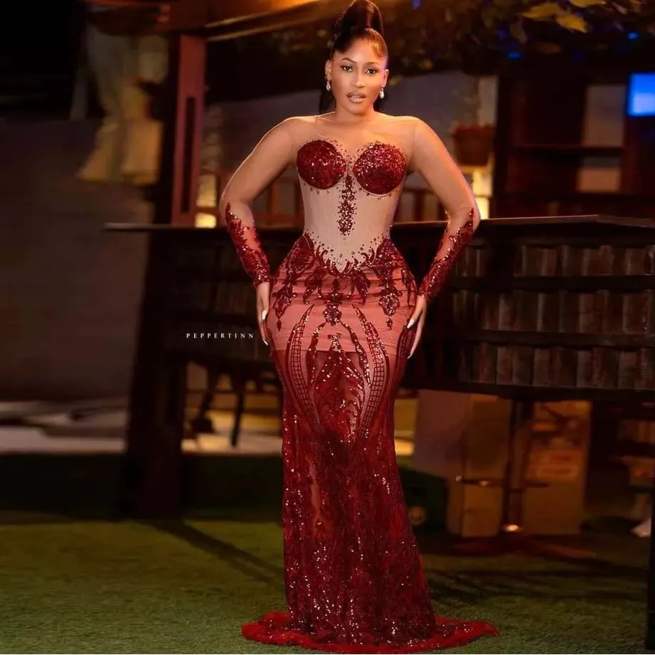 Aso Ebi стильное прозрачное Красное Кружевное платье-Русалка для выпускного вечера с длинными рукавами, сексуальное прозрачное женское платье макси со шнуровкой
Aso Ebi стильное прозрачное Красное Кружевное платье-Русалка для выпускного вечера с длинными рукавами, сексуальное прозрачное женское платье макси со шнуровкой