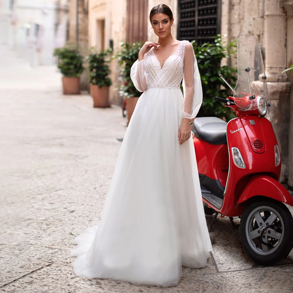 Long Sheer Puff Sleeves Beading Tulle Wedding Dress Custom Made Open Back Crystal Tassels A Line Crisscross Classic Bridal Gowns
Long Sheer Puff Sleeves Beading Tulle Wedding Dress Custom Made Open Back Crystal Tassels A Line Crisscross Classic Bridal Gowns
