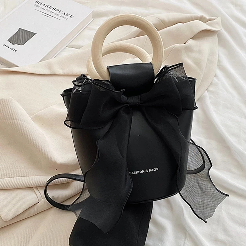 Модная женская сумка с бантом 2022, сумка-мессенджер на плечо, портативные сумки-ведра для женщин, простые сумки на шнурке, женская сумка
Модная женская сумка с бантом 2022, сумка-мессенджер на плечо, портативные сумки-ведра для женщин, простые сумки на шнурке, женская сумка