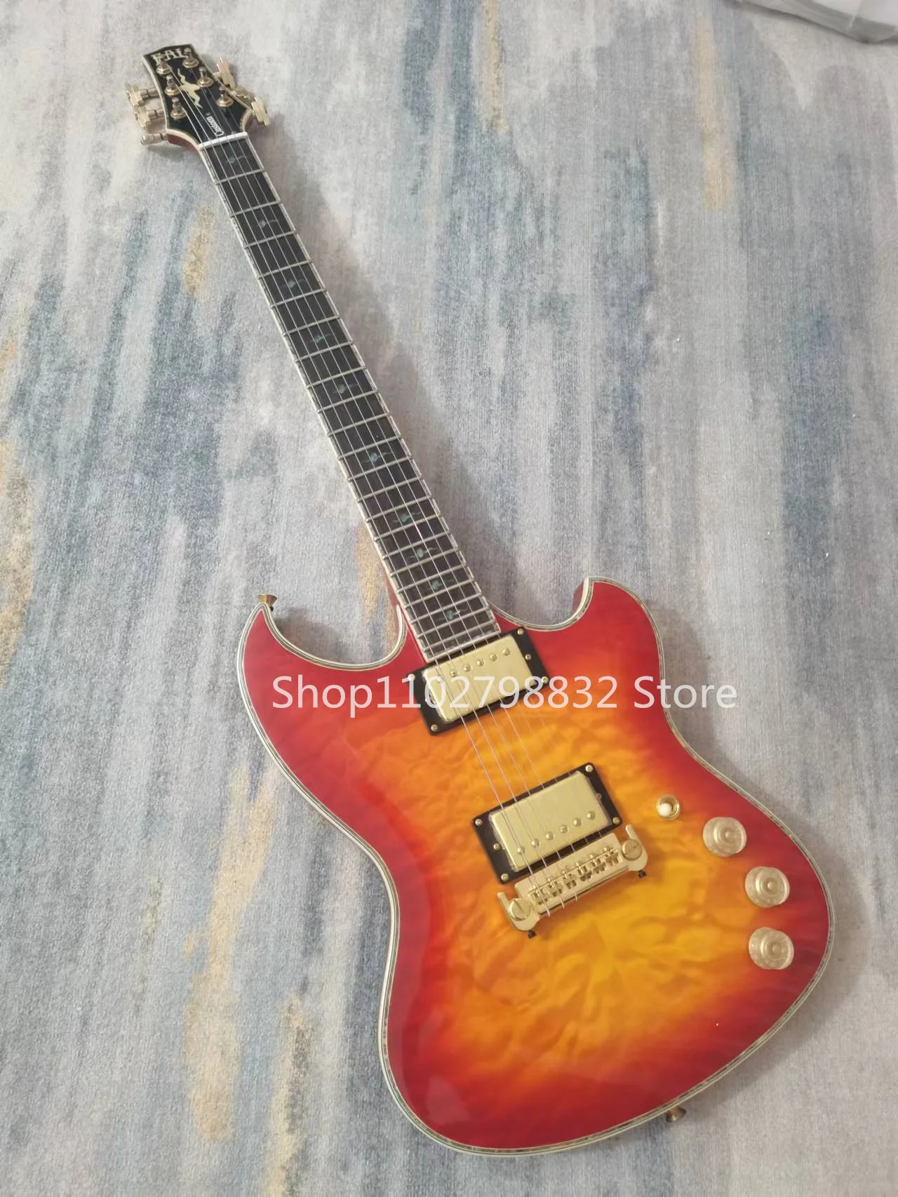 6-string electric guitar, Rose Wood fingerboard, colorful shell inlay, inverted bridge, gold accessories, free shipping
6-string electric guitar, Rose Wood fingerboard, colorful shell inlay, inverted bridge, gold accessories, free shipping