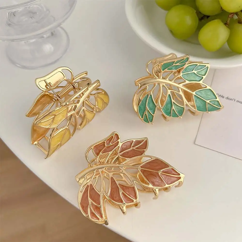 Темпераментный геометрический металлический зажим для волос, винтажный ажурный зажим в форме листа, акулы для женщин, аксессуары для волос
Темпераментный геометрический металлический зажим для волос, винтажный ажурный зажим в форме листа, акулы для женщин, аксессуары для волос