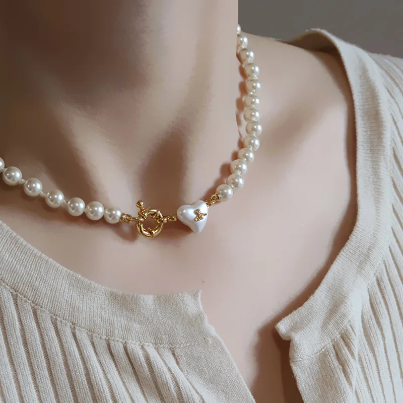 Love Pearl Necklace Women Simple and Versatile High-end Niche Design Sense Necklace Retro Clavicle Chain
Love Pearl Necklace Women Simple and Versatile High-end Niche Design Sense Necklace Retro Clavicle Chain