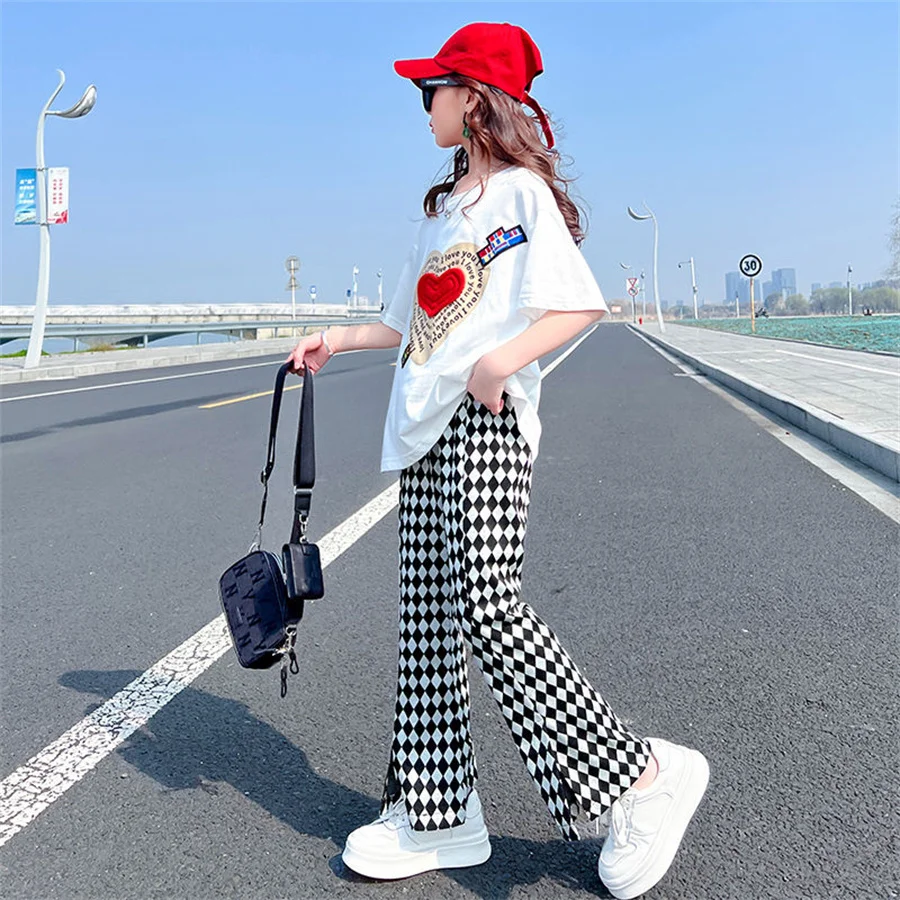 Summer Children's Short Sleeve Heart Print T-Shirt Tops + Casual Plaid Fair Leg Loose Pants Girls Clothing Sets Kids 2Pcs Suits 
Summer Children's Short Sleeve Heart Print T-Shirt Tops + Casual Plaid Fair Leg Loose Pants Girls Clothing Sets Kids 2Pcs Suits