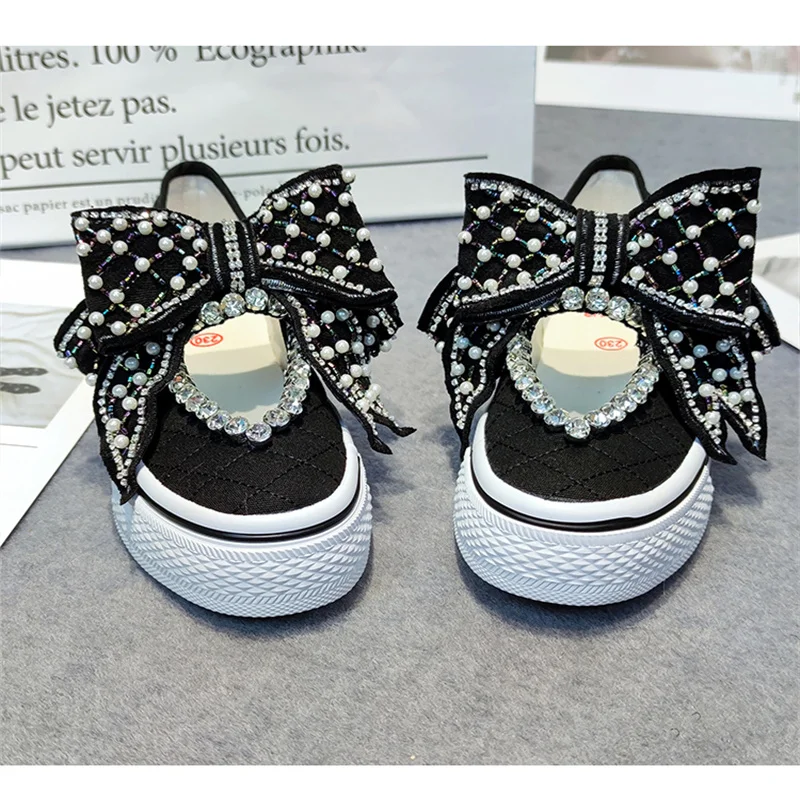 Women's all-match cute girls bow rhinestone handmade custom canvas shoes a pedal lazy walking shoes 35-41
Women's all-match cute girls bow rhinestone handmade custom canvas shoes a pedal lazy walking shoes 35-41