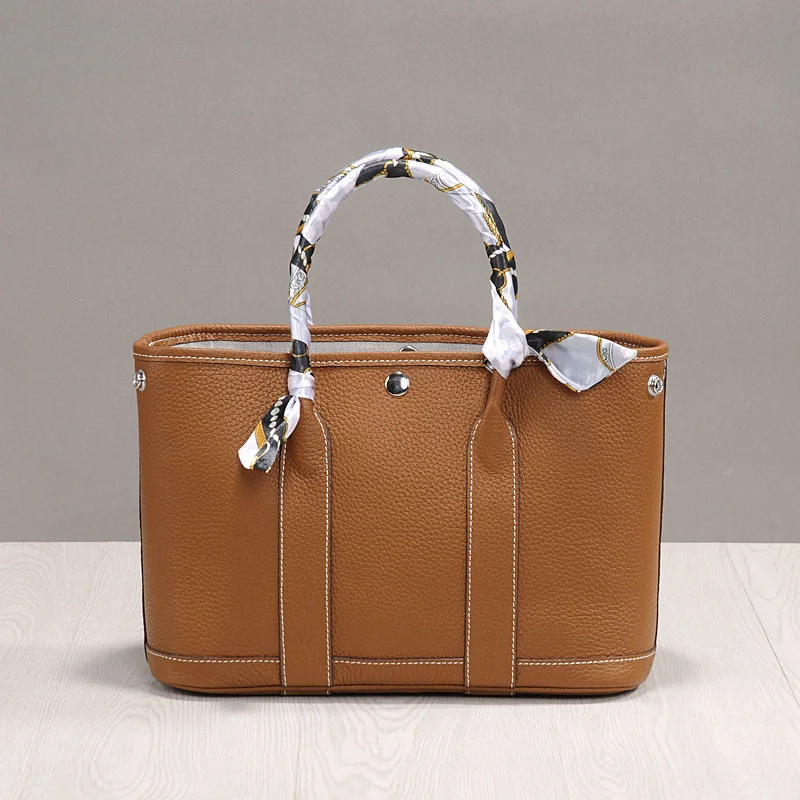 lychee pattern top layer cowhide portable leisure leather one shoulder women's bag garden bag 2022 new summer women's bags
lychee pattern top layer cowhide portable leisure leather one shoulder women's bag garden bag 2022 new summer women's bags
